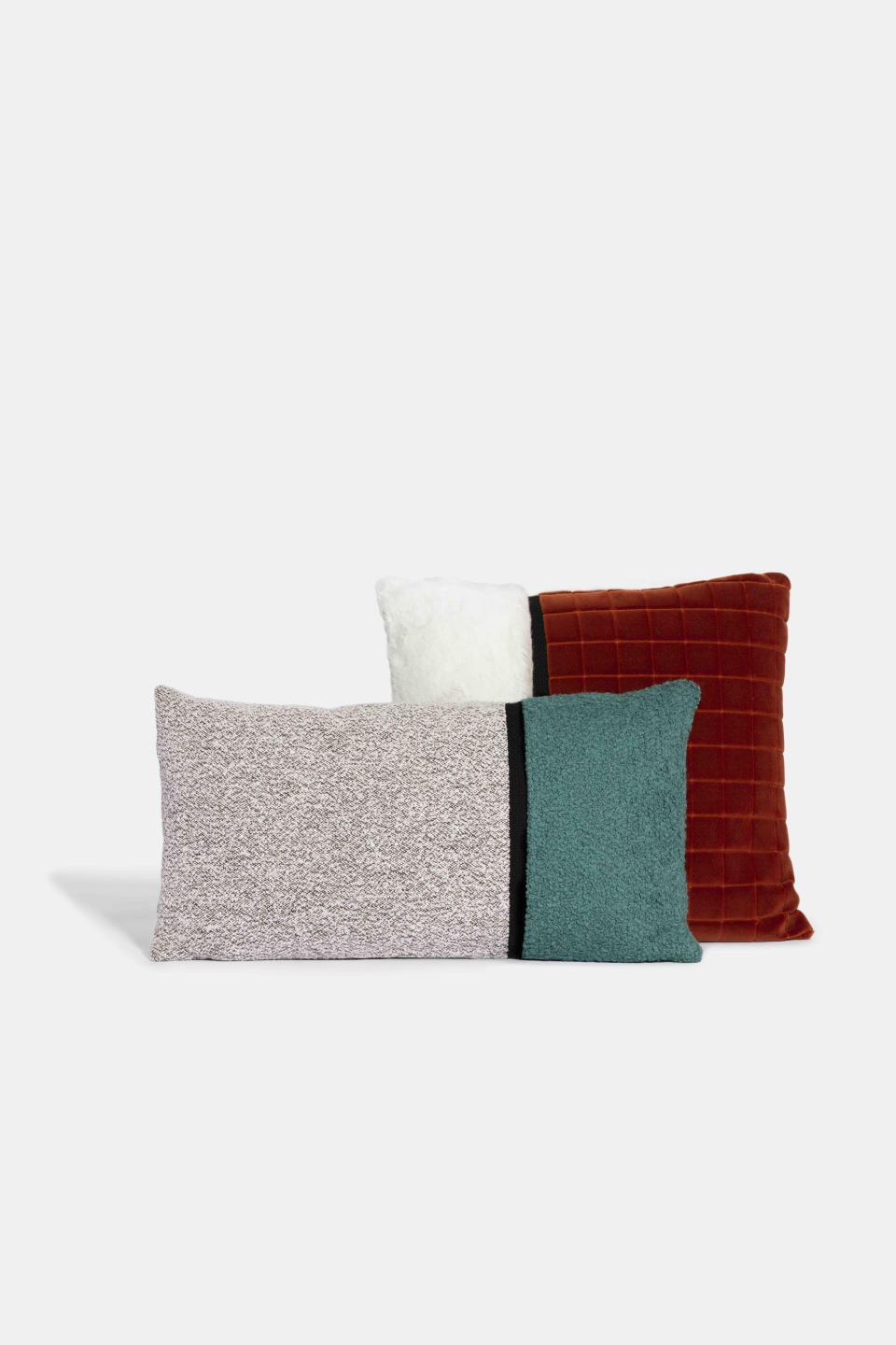 This image provided by Marrimor Objects shows Marrimor pillows. The collection features toss pillows that combine two different but equally soft materials like boucle, wool, velvet and faux fur. (Marrimor Objects via AP)