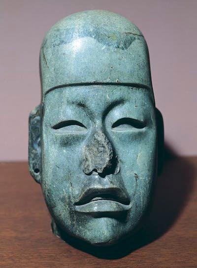 A jade head created during the Olmec civilization, now housed at Mexico City’s National Anthropology Museum. <a href="https://www.gettyimages.com/detail/news-photo/jade-head-from-mexico-olmec-civilization-13th-10th-century-news-photo/142932108?adppopup=true" rel="nofollow noopener" target="_blank" data-ylk="slk:DeAgostini/Getty Images;elm:context_link;itc:0;sec:content-canvas" class="link ">DeAgostini/Getty Images</a>