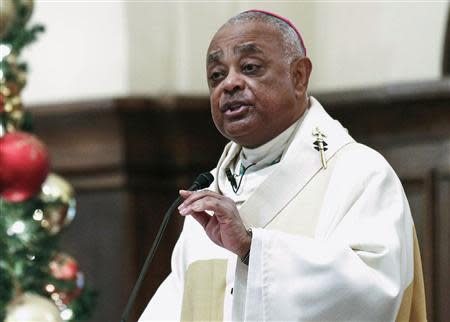 Roman Catholic Archbishop of Atlanta Wilton Gregory speaks to parishioners in Atlanta, Georgia, in this file photo taken December 5, 2013. REUTERS/Tami Chappell/Files