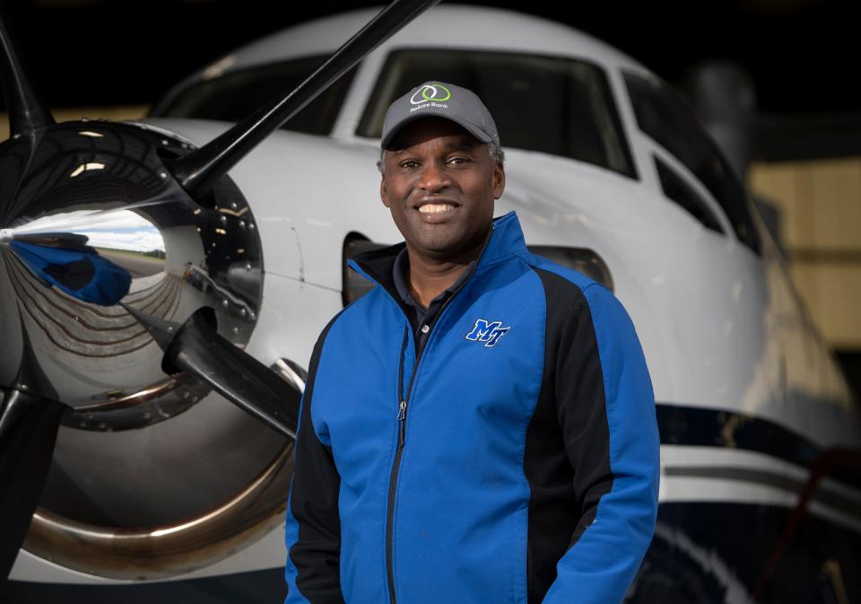 Nashville businessman and entrepreneur Darrell Freeman, who recently volunteered to fly a mission to retrieve COVID-19 test samples to speed up the process for patients, stands with his plane at Hollingshead Aviation Thursday, April 30, 2020, in Smyrna, Tenn.