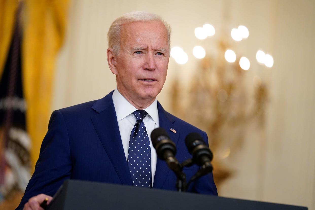 President Joe Biden speaks in the East Room of the White House in Washington.