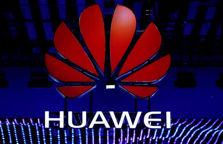 FILE PHOTO: The Huawei logo is seen at the Mobile World Congress in Barcelona, Spain, February 26, 2018. REUTERS/Yves Herman/File Photo/File Photo