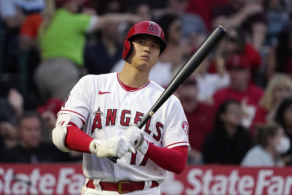 Los Angeles Angels' Shohei Ohtani approaches the plate before being intentionally walked during the second inning of a baseball game against the Baltimore Orioles Saturday, July 3, 2021, in Anaheim, Calif. (AP Photo/Mark J. Terrill)