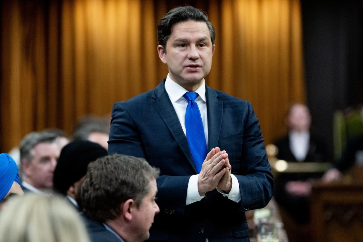 Conservative Party Leader Pierre Poilievre rises during question period on Parliament Hill in Ottawa, on Wednesday, March 20, 2024. (Spencer Colby/Canadian Press - image credit)