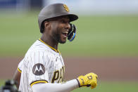 San Diego Padres' Jurickson Profar celebrates after hitting a home run during the first inning of a baseball game against the Cincinnati Reds, Monday, April 29, 2024, in San Diego. (AP Photo/Gregory Bull)