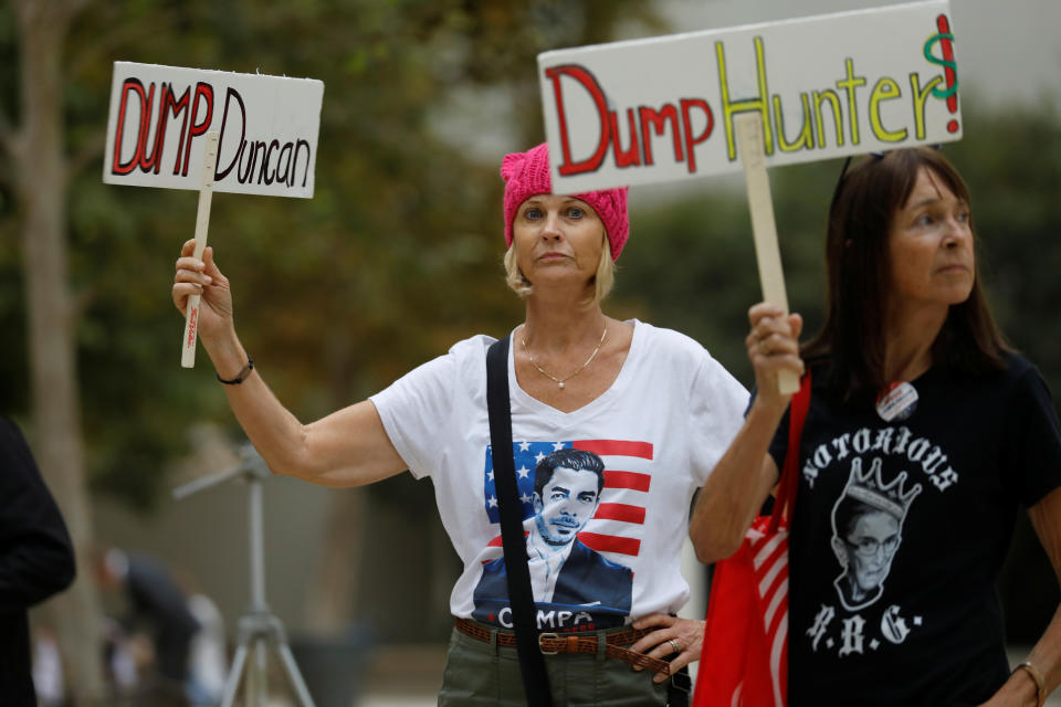 Protesters gather as Rep. Duncan Hunter, R-Calif., makes an appearance at federal court in San Diego on Sept. 24, 2018. (Photo: Mike Blake/Reuters)