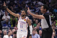 Oklahoma City Thunder guard Isaiah Joe (11) celebrates after sinking a three-point basket in the first half against the Dallas Mavericks during the first half in Game 3 of an NBA basketball second-round playoff series, Saturday, May 11, 2024, in Dallas. (AP Photo/Tony Gutierrez)