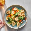 <p>This creamy tortellini and vegetable pasta is a real crowd pleaser. To make it even quicker, use frozen chopped vegetables instead of fresh. Serve with a green salad and whole-grain baguette.</p> <p> <a href="https://www.eatingwell.com/recipe/252331/tortellini-primavera/" rel="nofollow noopener" target="_blank" data-ylk="slk:View Recipe;elm:context_link;itc:0;sec:content-canvas" class="link ">View Recipe</a></p>