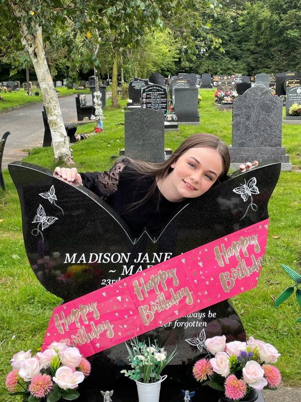 Lancashire Telegraph: Scarlett at Maddi's grave