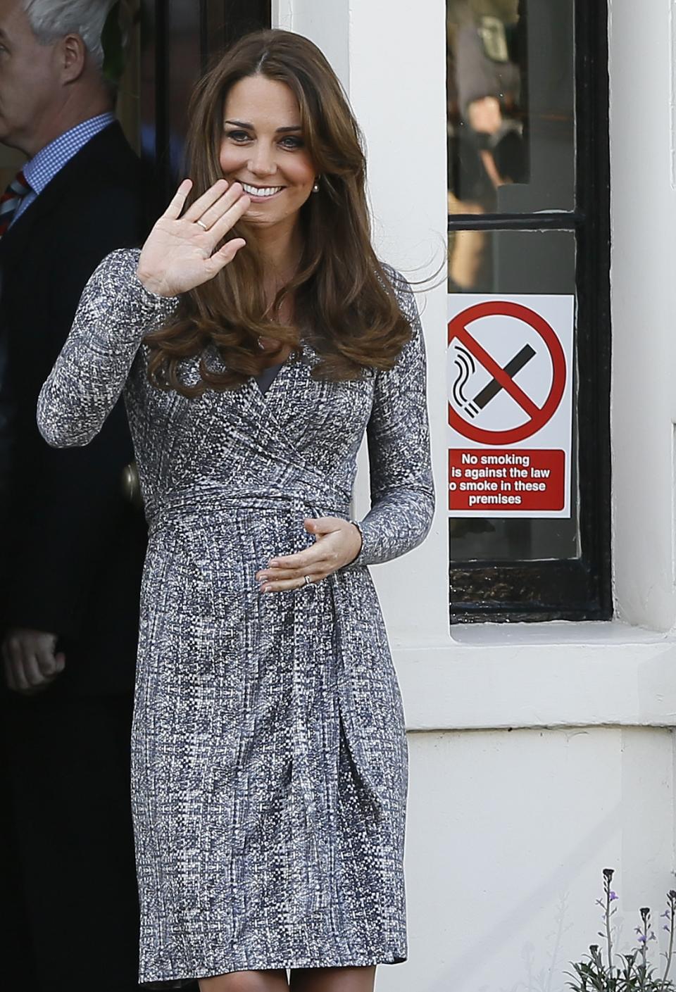 Britain's Kate, The Duchess of Cambridge waves as she leaves after a visit to Hope House, in London, Tuesday, Feb. 19, 2013. As patron of Action on Addiction, the Duchess was visiting Hope House, a safe, secure place for women to recover from substance dependence. (AP Photo/Kirsty Wigglesworth)