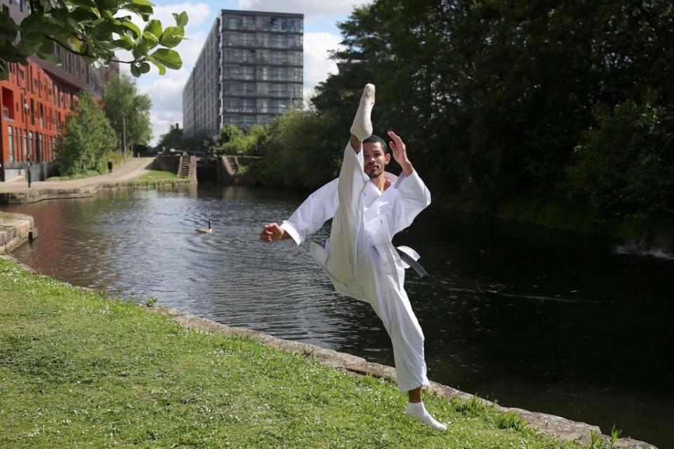 Team GB’s karate athlete Jordan Thomas trains outside his apartment in Manchester (REUTERS)