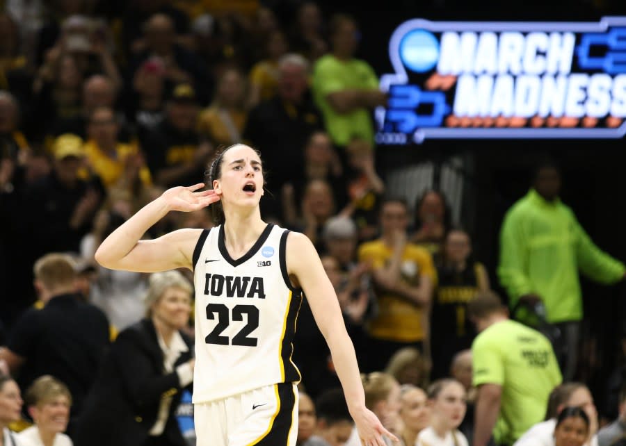 IOWA CITY, IOWA- MARCH 25: Guard Caitlin Clark #22 of the Iowa Hawkeyes celebrates after drawing a foul late in the second half against the West Virginia Mountaineers during their second round match-up in the 2024 NCAA Division 1 Women’s Basketball Championship at Carver-Hawkeye Arena on March 25, 2024 in Iowa City, Iowa. (Photo by Matthew Holst/Getty Images)