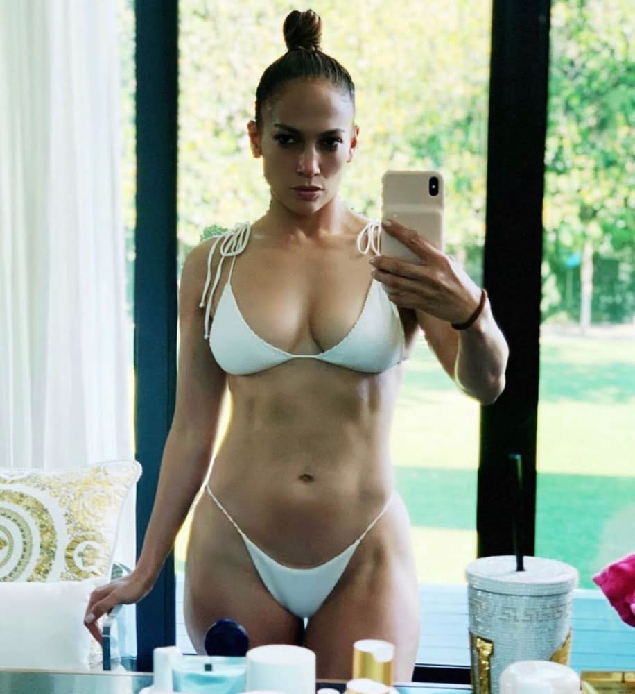 Jennifer Lopez, 50, shows off her six-pack in a string bikini as she feels "relaxed and recharged" on Sunday, Feb. 16, 2020.