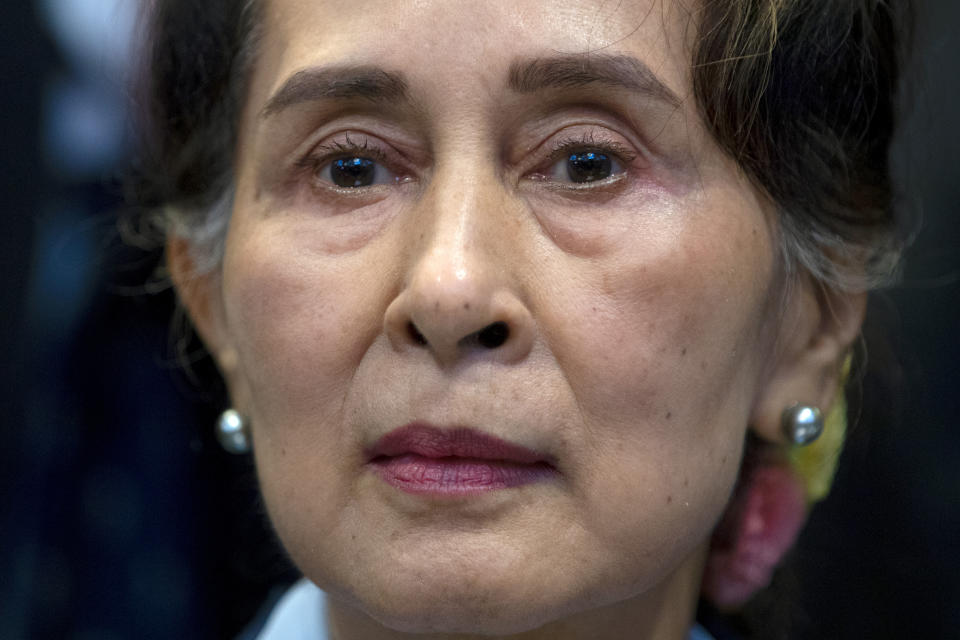 FILE - Myanmar's leader Aung San Suu Kyi waits to address judges of the International Court of Justice in The Hague, Netherlands, Dec. 11, 2019. An international case accusing Myanmar of genocide against the Rohingya ethnic minority returns to the United Nations' highest court Monday, Feb. 21, 2022, amid questions over whether the country's military rulers should even be allowed to represent the Southeast Asian nation. (AP Photo/Peter Dejong, File)