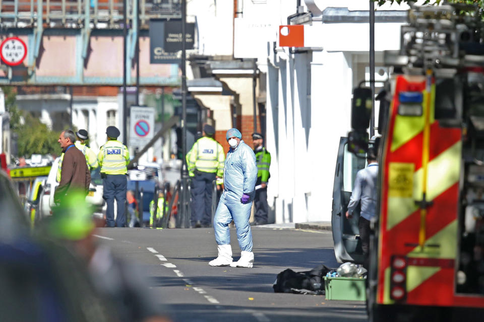 Forensic officers near the scene.&nbsp;