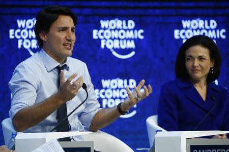 Justin Trudeau, Prime Minister of Canada and Sheryl Sandberg, Chief Operating Officer of Facebook attends the annual meeting of the World Economic Forum (WEF) in Davos, Switzerland January 22, 2016. REUTERS/Ruben Sprich