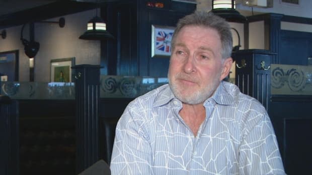 Firkin Group of Pubs president Larry Isaacs has raised several issues he has with the passport rollout.  (CBC - image credit)