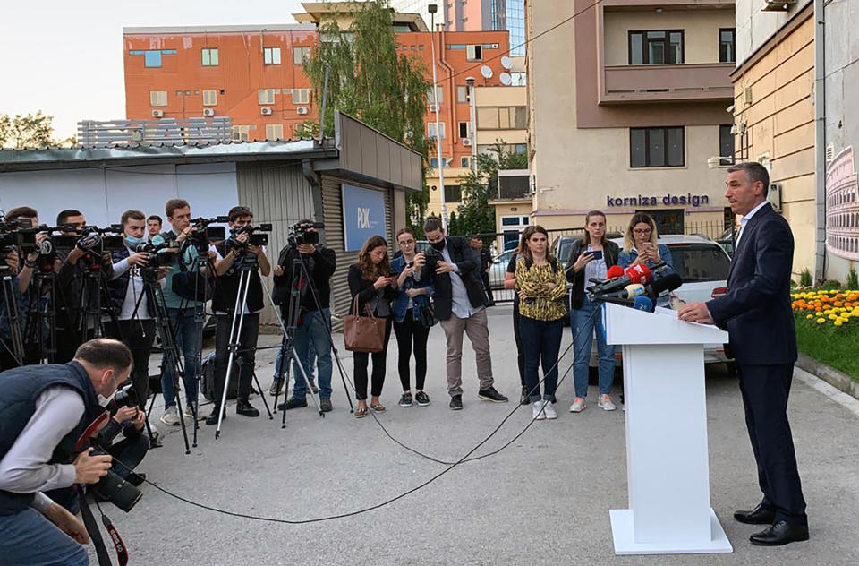 Kadri Veseli, leader of the opposition Democratic Party of Kosovo (PDK), speaks during a press conference in Pristina, Kosovo, on Wednesday, June, 24, 2020. Kosovo President Hashim Thaci and nine other former separatist fighters were indicted Wednesday on a range of crimes against humanity and war crimes charges, including murder, by an international court investigating their actions against ethnic Serbs and others during and after Kosovo's 1998-99 independence war with Serbia. The indicted group includes Kadri Veseli. (AP Photo/Zenel Zhinipotoku)