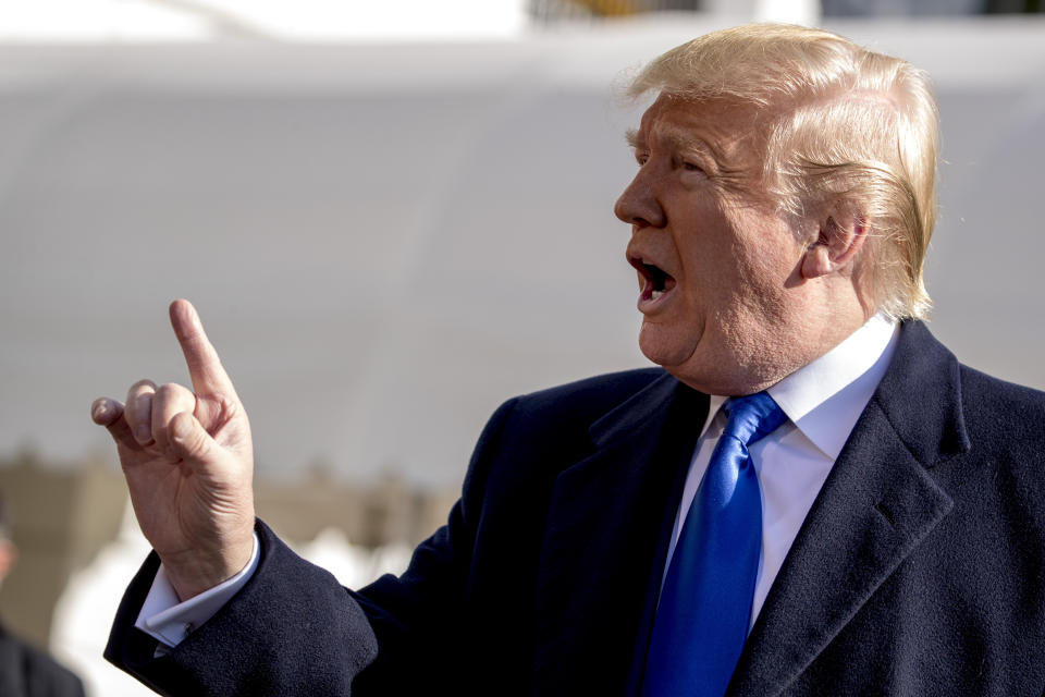 President Donald Trump tells a reporter to be quiet as he speaks on the South Lawn of the White House in Washington, Friday, Nov. 8, 2019, before boarding Marine One for a short trip to Andrews Air Force Base, Md. and then on to Georgia to meet with supporters. (AP Photo/Andrew Harnik)