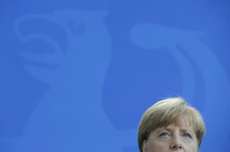 German Chancellor Angela Merkel looks on during a news conference at the Chancellery in Berlin, Germany September 8, 2015. REUTERS/Fabrizio Bensch