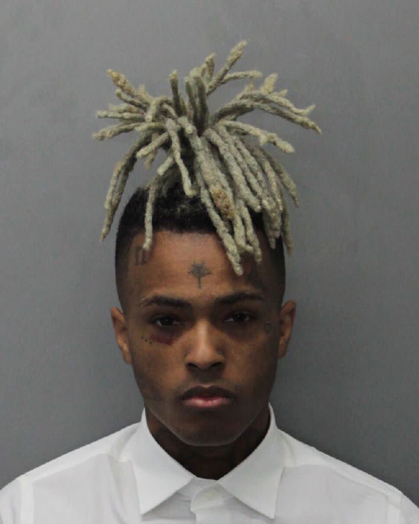 Rapper XXXTentacion pictured in a mugshot taken Dec. 15, 2017, in Miami for his domestic violence case. (Photo: Miami Dade County Corrections via Getty Images)