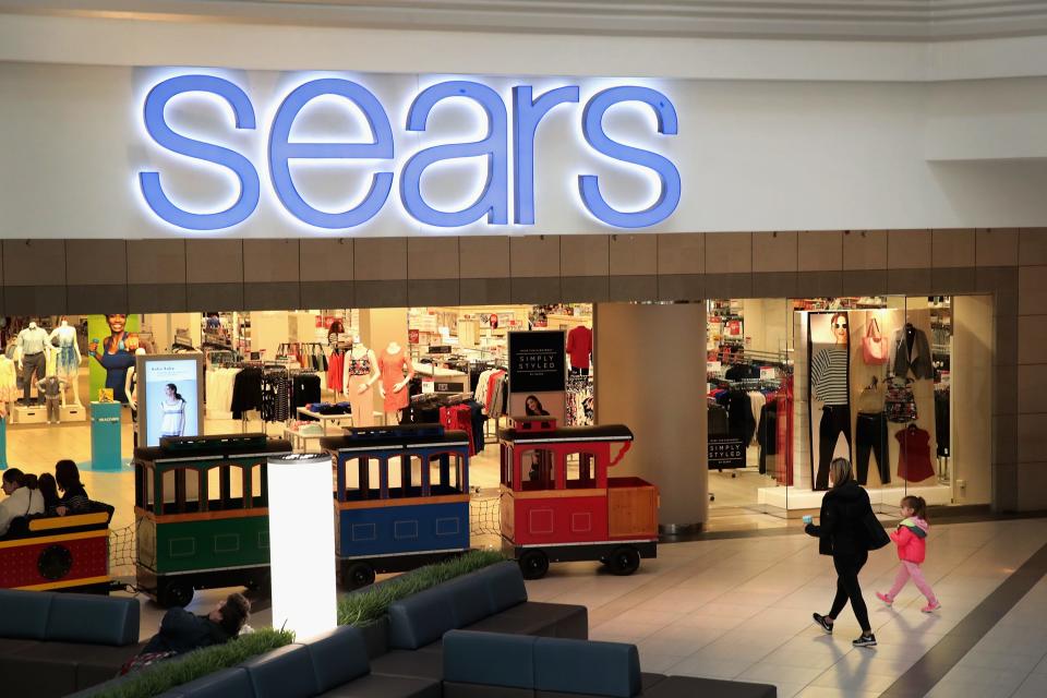 People shop at a Sears store on March 22, 2017, in Schaumburg, Illinois.