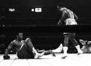 <p>Joe Frazier knocks down Muhammad Ali in the 15th round of the “Fight of the Century.” (AP Photo)</p> 