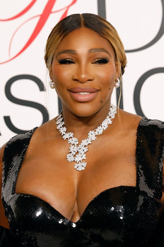 serena williams smiling on a red carpet