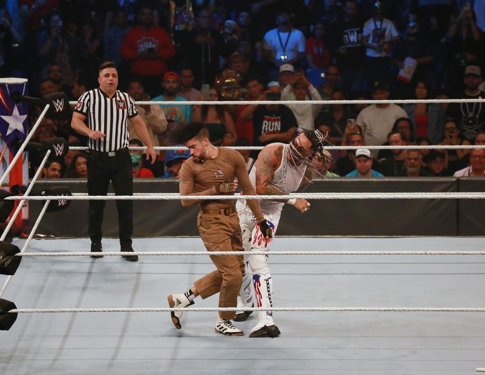 Bad Bunny and Damian Priest wrestle during the WWE Backlash at Coliseo de Puerto Rico José Miguel Agrelot on May 06, 2023 in San Juan, Puerto Rico.