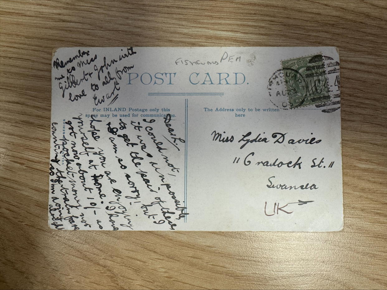 121-year-old postcard with black, cursive writing