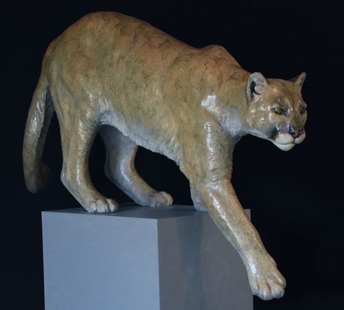 Cougar (LS) by Jim Eppler. Bronze 59 ¼”L x 27 ½”H x 12 ½” W - extends 10” below the surface.