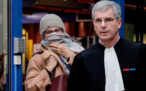 Brigitte Gruel (L), former culture assistant of ex-civil service minister and mayor of Draveil Georges Tron, arrives in court - Credit: THOMAS SAMSON/AFP