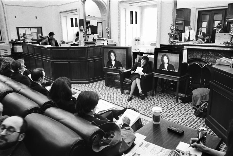 Reporters listen remotely to the testimony of Monica Lewinsky during the Clinton impeachment trial in the Senate in 1999. (Photo: David Hume Kennerly/Getty Images)