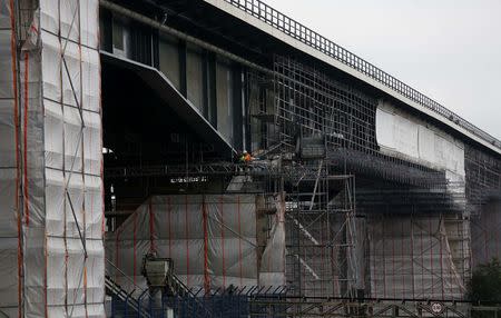 The construction site of the motorway A59 bridge is seen in Duisburg August 15, 2014. In recent weeks, the economy that proud German politicians have taken to describing as a "growth locomotive" and "stability anchor" for Europe, has been hit by a barrage of bad news that has surprised even the most ardent Germany sceptics. The big shocker came on August 14, 2014, when the Federal Statistics Office revealed that gross domestic product (GDP) had contracted by 0.2 percent in the second quarter. TO MATCH STORY GERMANY-ECONOMY/ REUTERS/Ina Fassbender (GERMANY - Tags: POLITICS TRANSPORT BUSINESS)