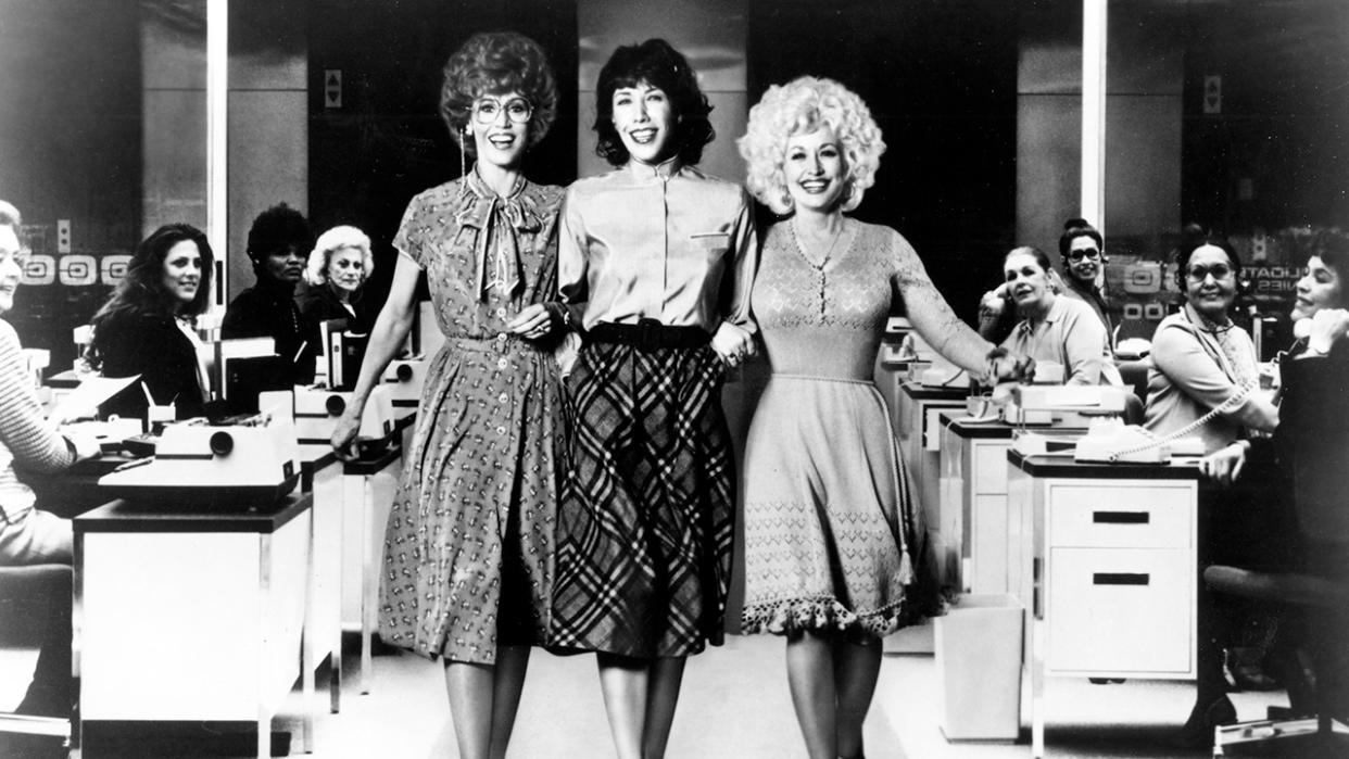  Jane Fonda, Lily Tomlin and Dolly Parton in an original still from 9 to 5. 