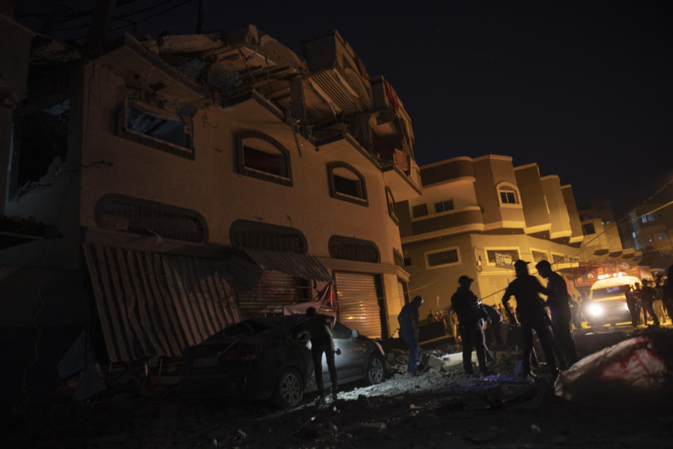 FILE - Palestinians check the damage of a house targeted by Israeli missile strikes in Gaza City, Tuesday, Nov. 12, 2019, killing Bahaa Abu el-Atta, a senior Islamic Jihad commander. Prime Minister Benjamin Netanyahu and other Israeli leaders have repeatedly threatened to kill Hamas leaders following the group's deadly Oct. 7, 2023 cross-border attack that sparked the war in Gaza. Israel has a long history of assassinating its enemies, many carried out with precision airstrikes. (AP Photo/Khalil Hamra, File)