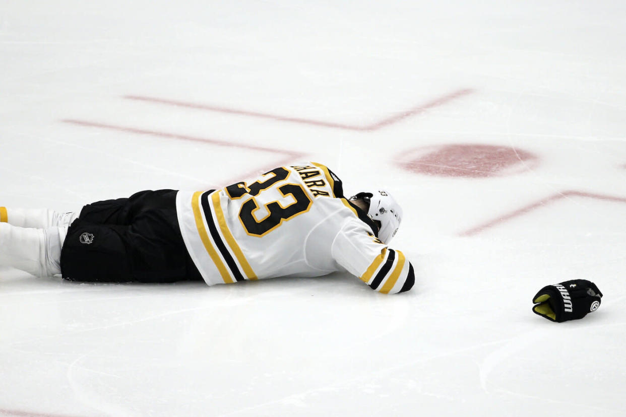 Boston Bruins defenseman Zdeno Chara left Game 4 of the Stanley Cup Final after taking a deflected shot to the face. (AP Photo/Scott Kane)