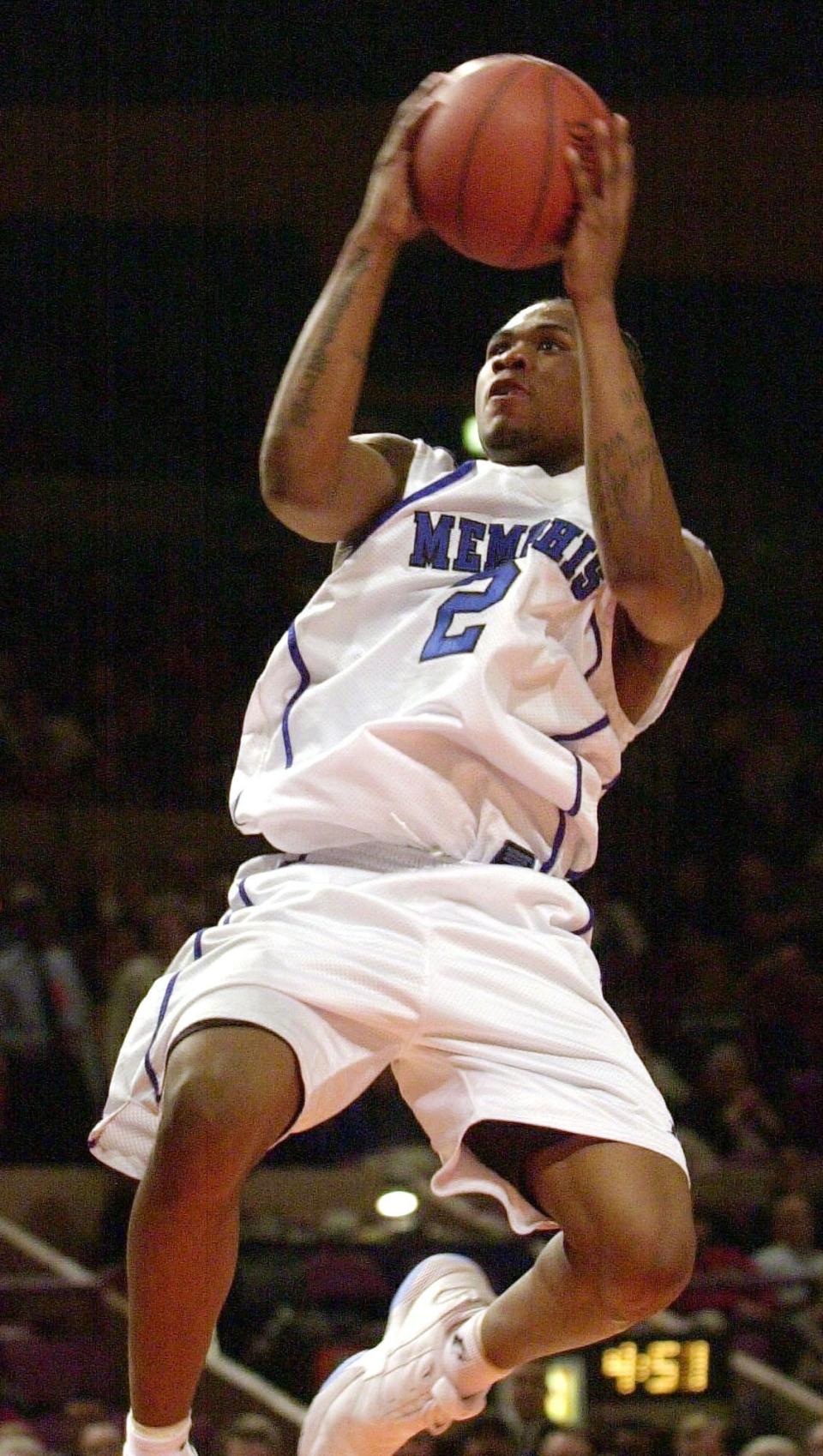 Memphis' Dajuan Wagner drives to the basket in the first half of a semifinal game against Temple in the National Invitational Tournament Tuesday, March 26, 2002 in New York. (AP Photo/Mark Lennihan)