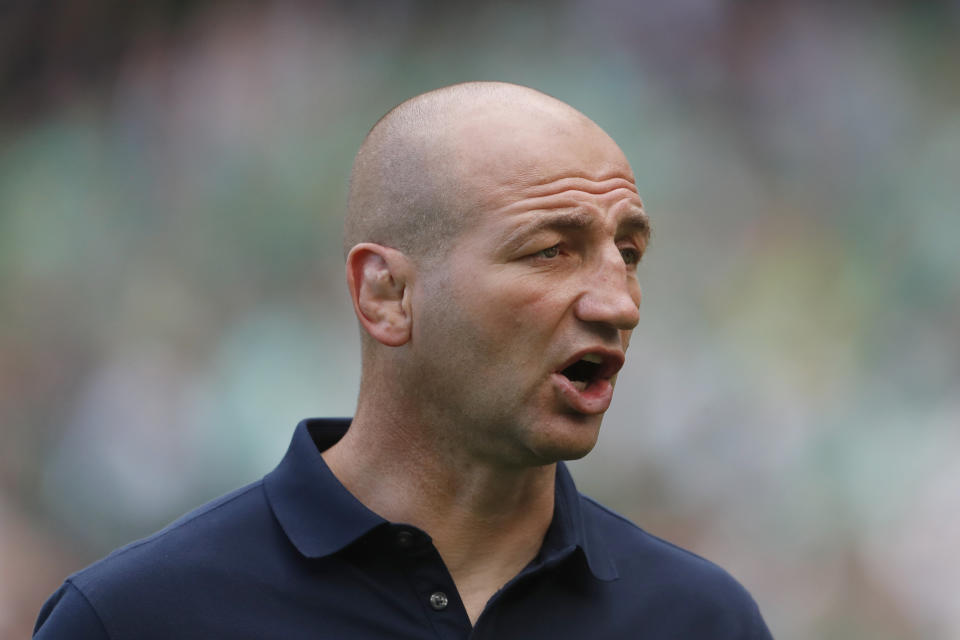 England's head coach Steve Borthwick watches on players warm up for the international rugby union match between Ireland and England, at Aviva Stadium, Dublin, Ireland, Saturday, Aug. 19, 2023. (AP Photo/Peter Morrison)