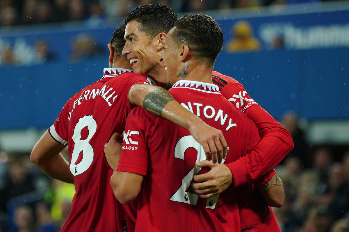 Cristiano Ronaldo (centre) celebrates after scoring for Manchester United against Everton (Peter Byrne/PA) (PA Wire)