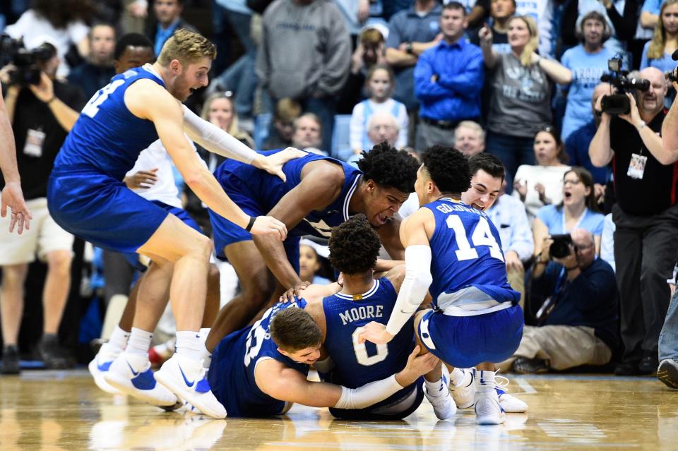 Feb 8, 2020; Chapel Hill, North Carolina, USA; Duke Blue Devils celebrate with forward Wendell Moore Jr. (0) after he hit the winning basket in the last second in overtime at Dean E. Smith Center.