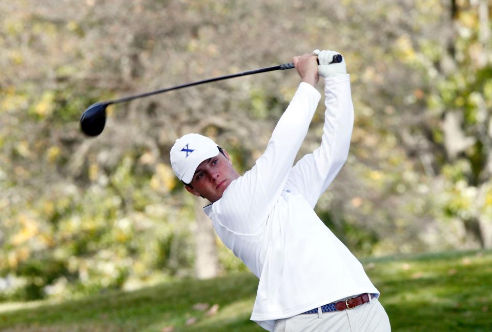 St. Xavier's Robert Gerwin tees-off during the round one of the Division I Boys State Golf Championships at the Ohio State Golf Club Scarlet Course on Oct. 21.