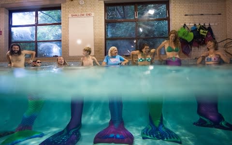 Mermaiding students at a pool in Bournemouth - Credit: Jack Taylor