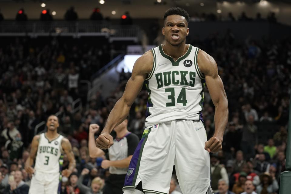 Milwaukee Bucks' Giannis Antetokounmpo reacts after makin g a shot and being fouled during the second half of an NBA basketball game against the Los Angeles Lakers Wednesday, Nov. 17, 2021, in Milwaukee. The Bucks won 109-102. (AP Photo/Morry Gash)