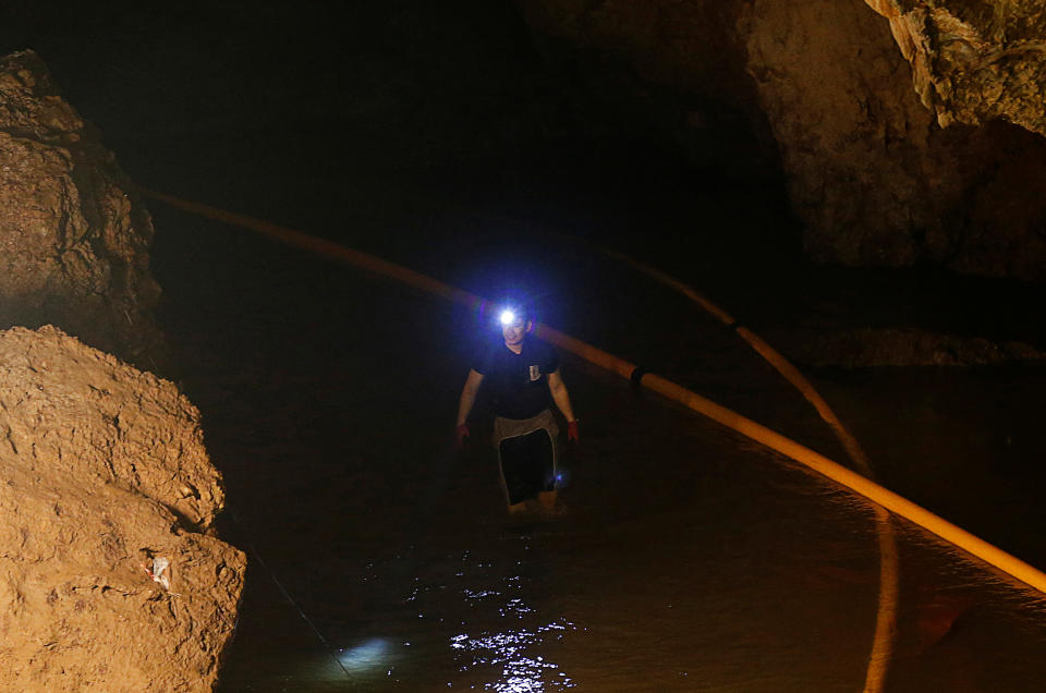 <p>A diver walks in the Tham Luang cave complex during the search for members of an under-16 soccer team and their coach in Chiang Rai, Thailand, on July 1, 2018. (Photo: Soe Zeya Tun/Reuters) </p>