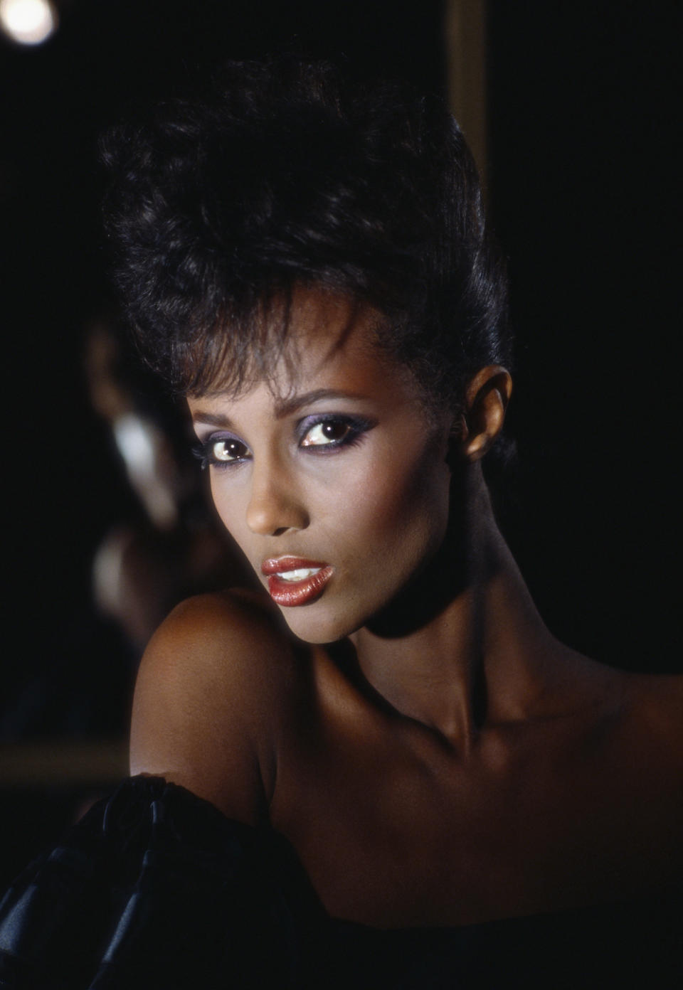 Fashion model Iman poses for photographs