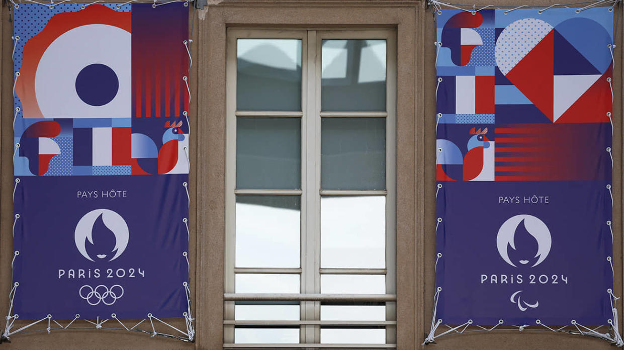 A photo Paris 2024 Olympic and Paralympic Games posters. Stock photo: Getty Images