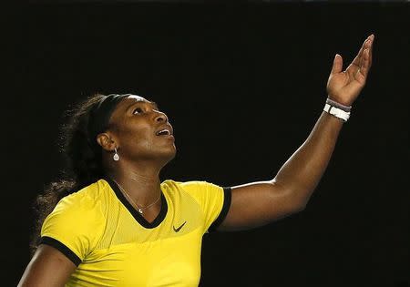 Serena Williams of the U.S. reacts during her final match against Germany's Angelique Kerber at the Australian Open tennis tournament at Melbourne Park, Australia, January 30, 2016. REUTERS/Tyrone Siu