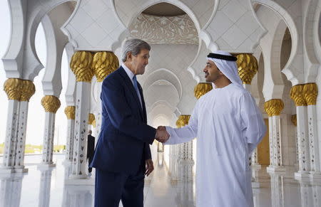 U.S. Secretary of State John Kerry shakes hands with UAE's Foreign Minister Sheikh Abdullah bin Zayed Al Nahyan at the Sheikh Zayed Grand Mosque in Abu Dhabi, November 23, 2015. REUTERS/Jacquelyn Martin/Pool