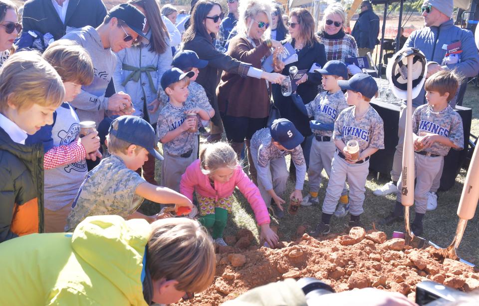 A groundbreaking ceremony was held for the baseball stadium in downtown Spartanburg on Nov. 1, 2023. The public was invited to collect soil in jars as keepsakes from the event.